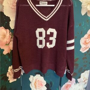 No Boundaries Burgundy V-Neck Sweater with Varsity Accents